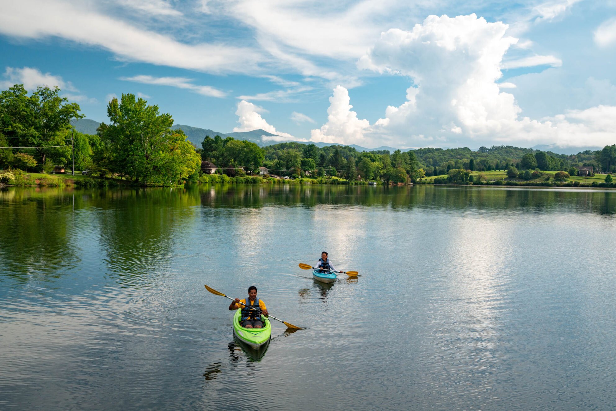 Kayakers paddling across Lake Junaluska