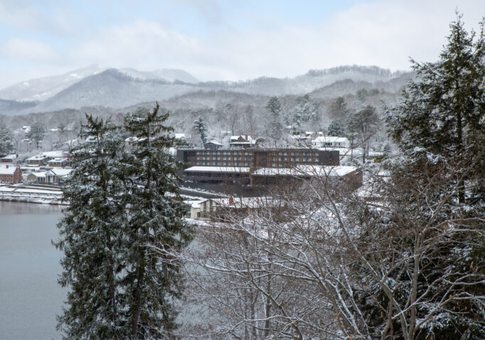 The Terrace Hotel with a lake view in snow