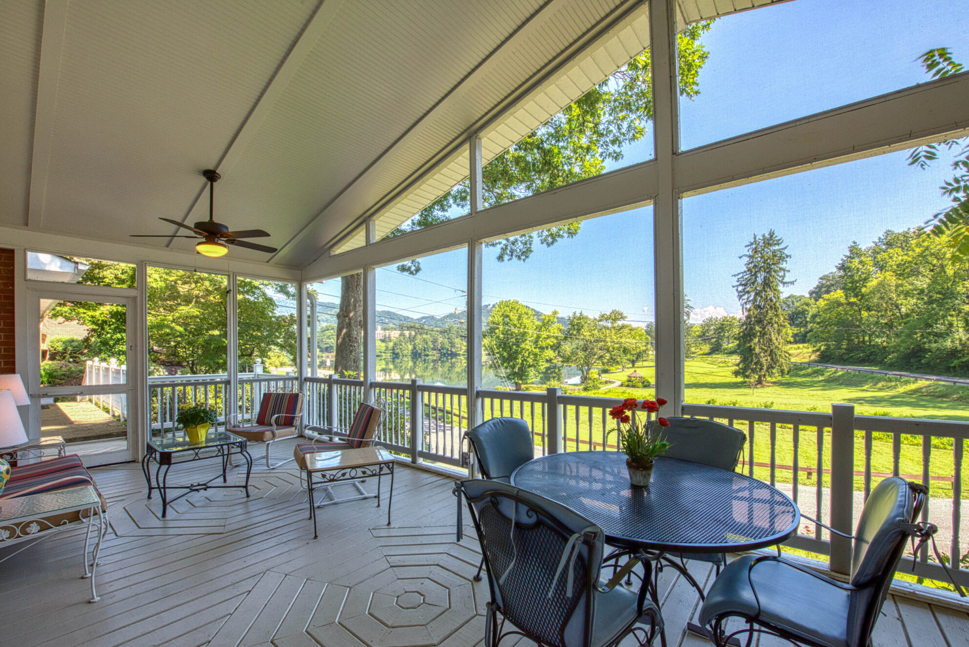 Lake Junaluska vacation rental screen porch with view of the golf course