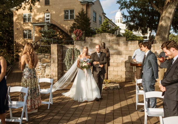 Wedding ceremony with Lambuth Inn in the background