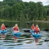 Girlfriends kayaking on Lake Junaluska