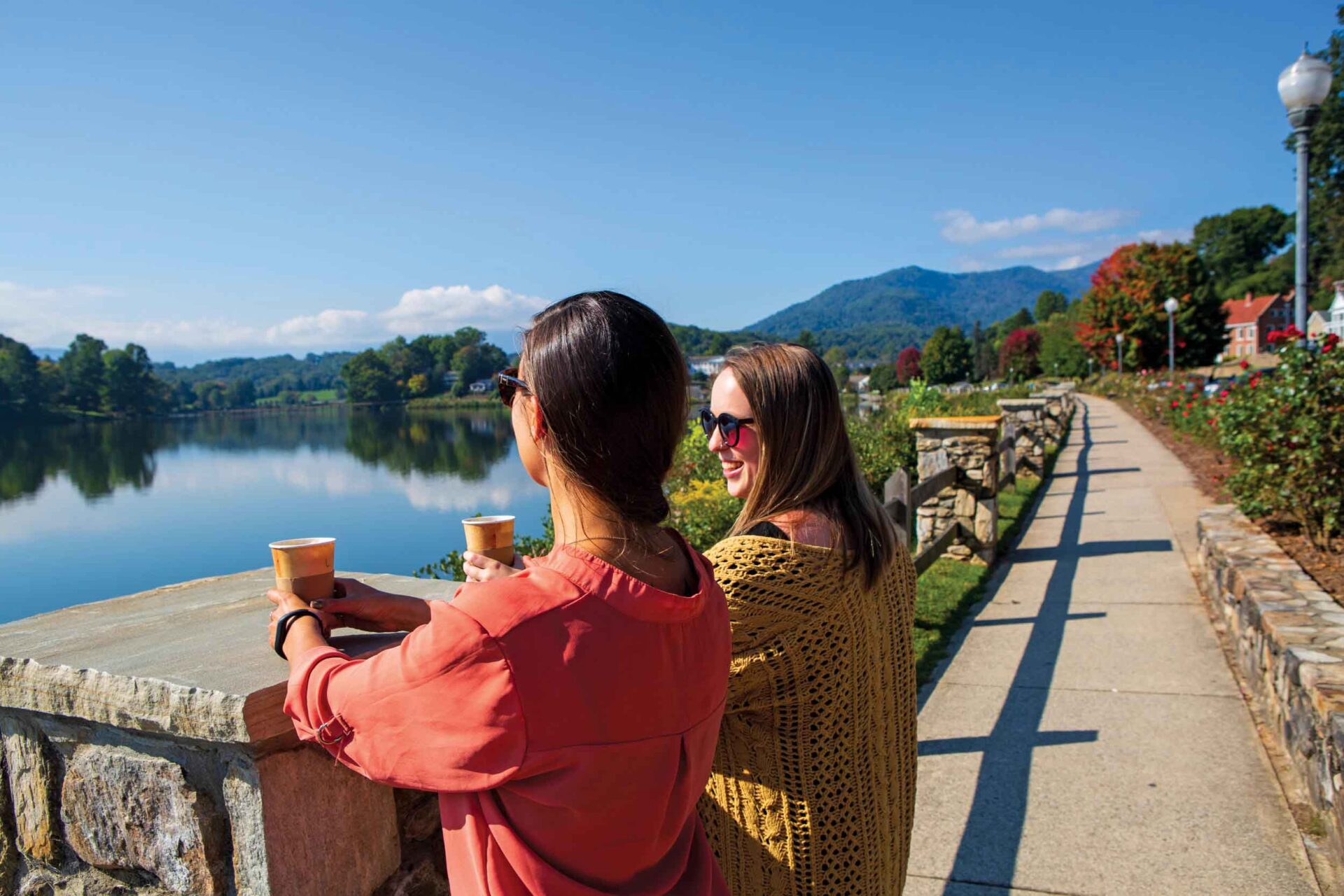 Friends enjoy coffee on the Rose Walk