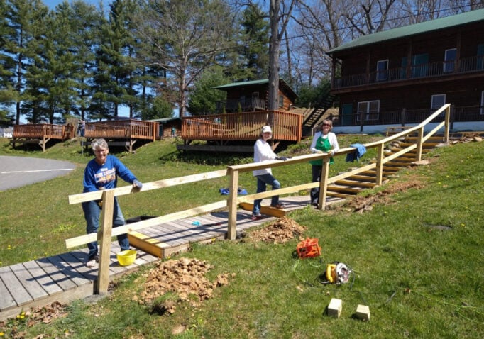NOMADS Mission Volunteers work on a handrail at Lake Junaluska.