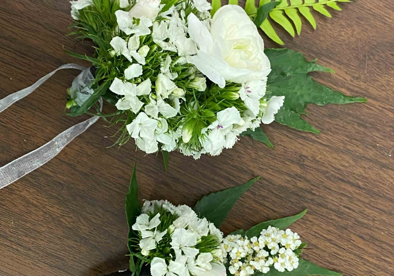 Bouquet and boutonnière by Lake Junaluska Florals