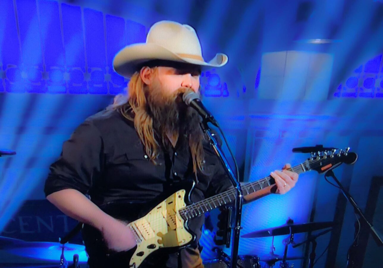 Chris Stapleton is playing this Fender Jazzmaster guitar, which belonged to Darren Nicholson's dad. The orange label on the headstock still has the name 