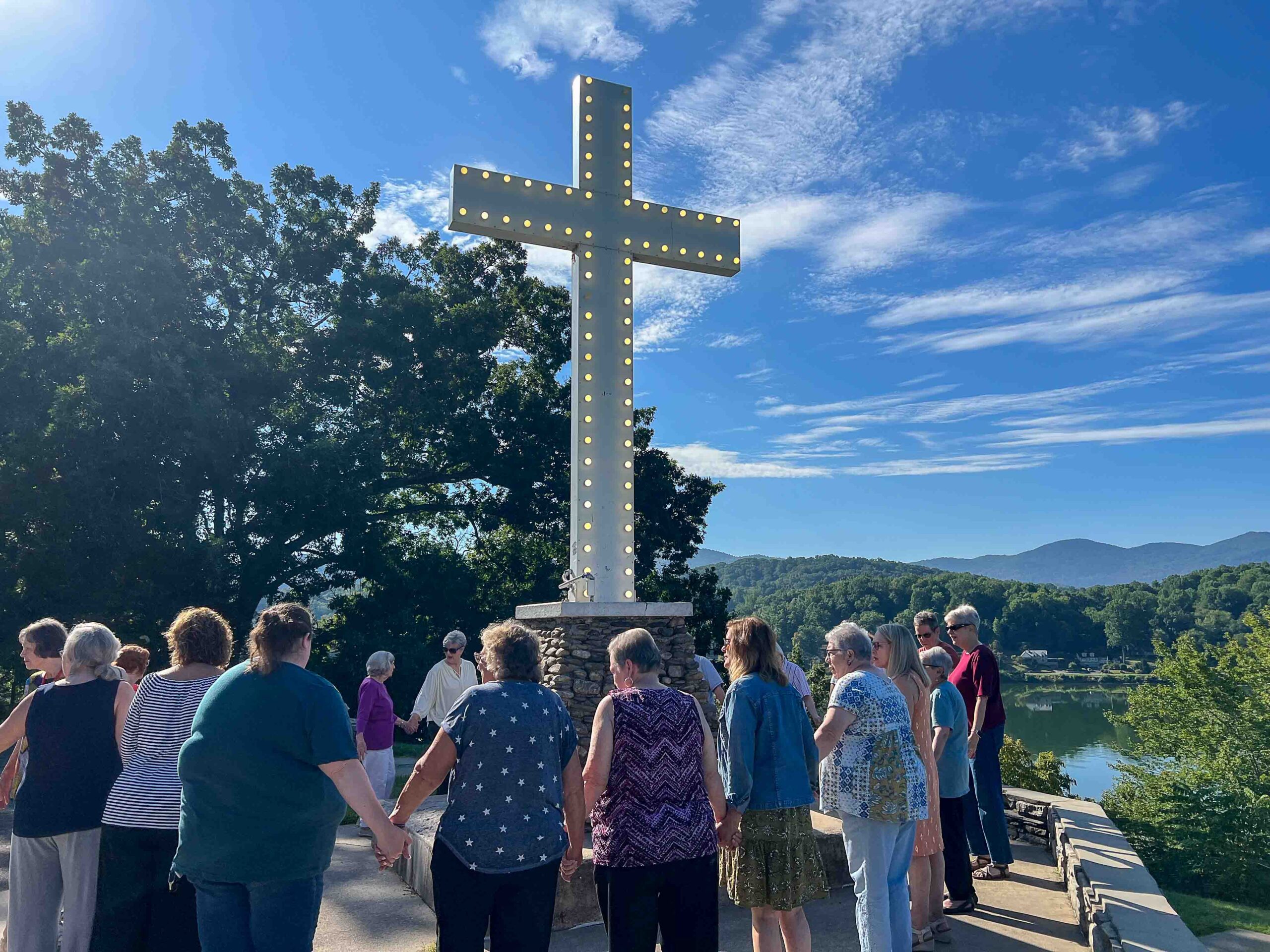 Journey to Joy retreat participants gather at the Lake Junaluska Cross