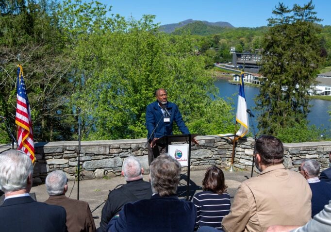 Rev. Billy Staley leads a prayer during the 2023 National Day of Prayer at the Lake Junaluska amphitheater